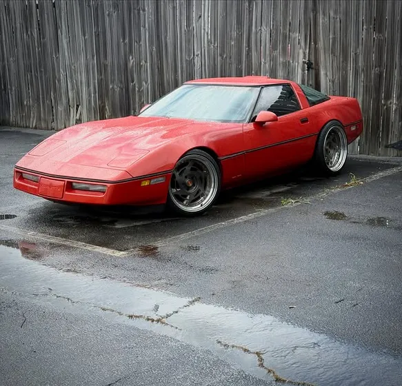 Red C4 Corvette at the shop